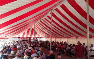 people in large tent